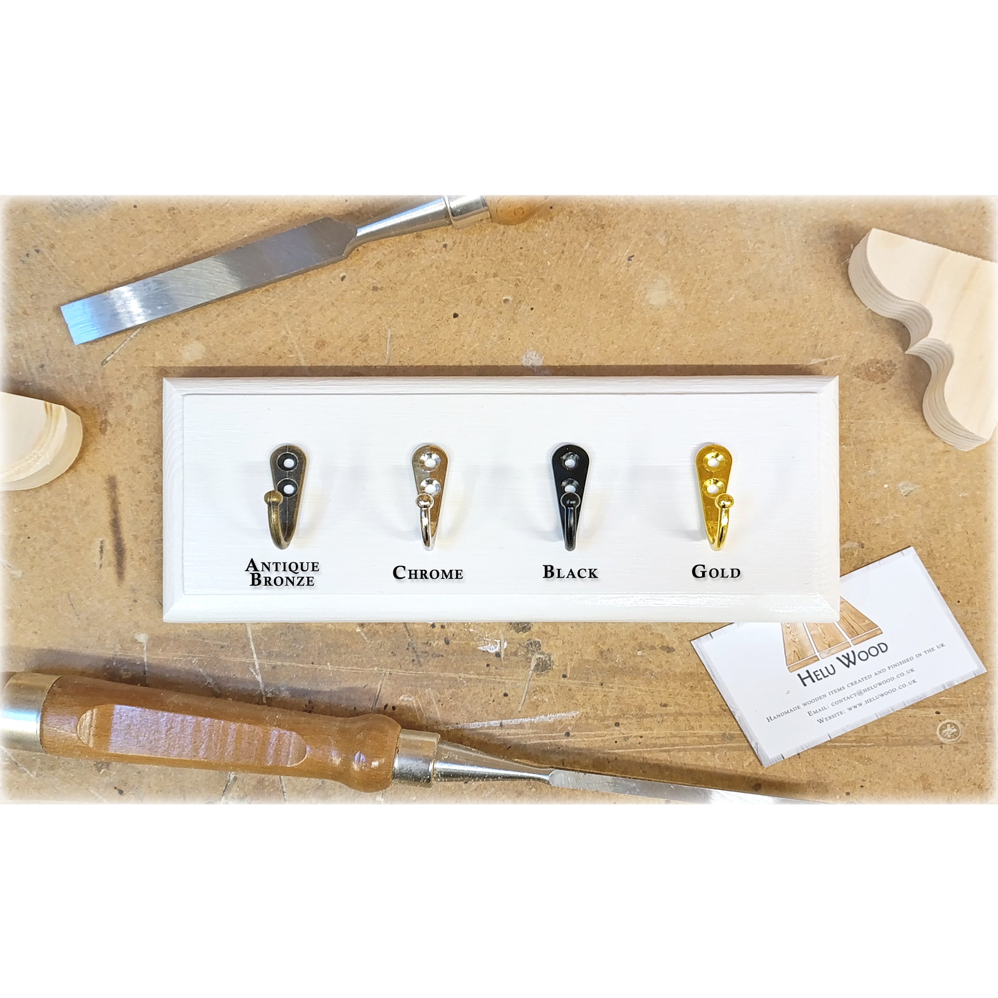 Set of wood carving tools with color options on a wooden surface