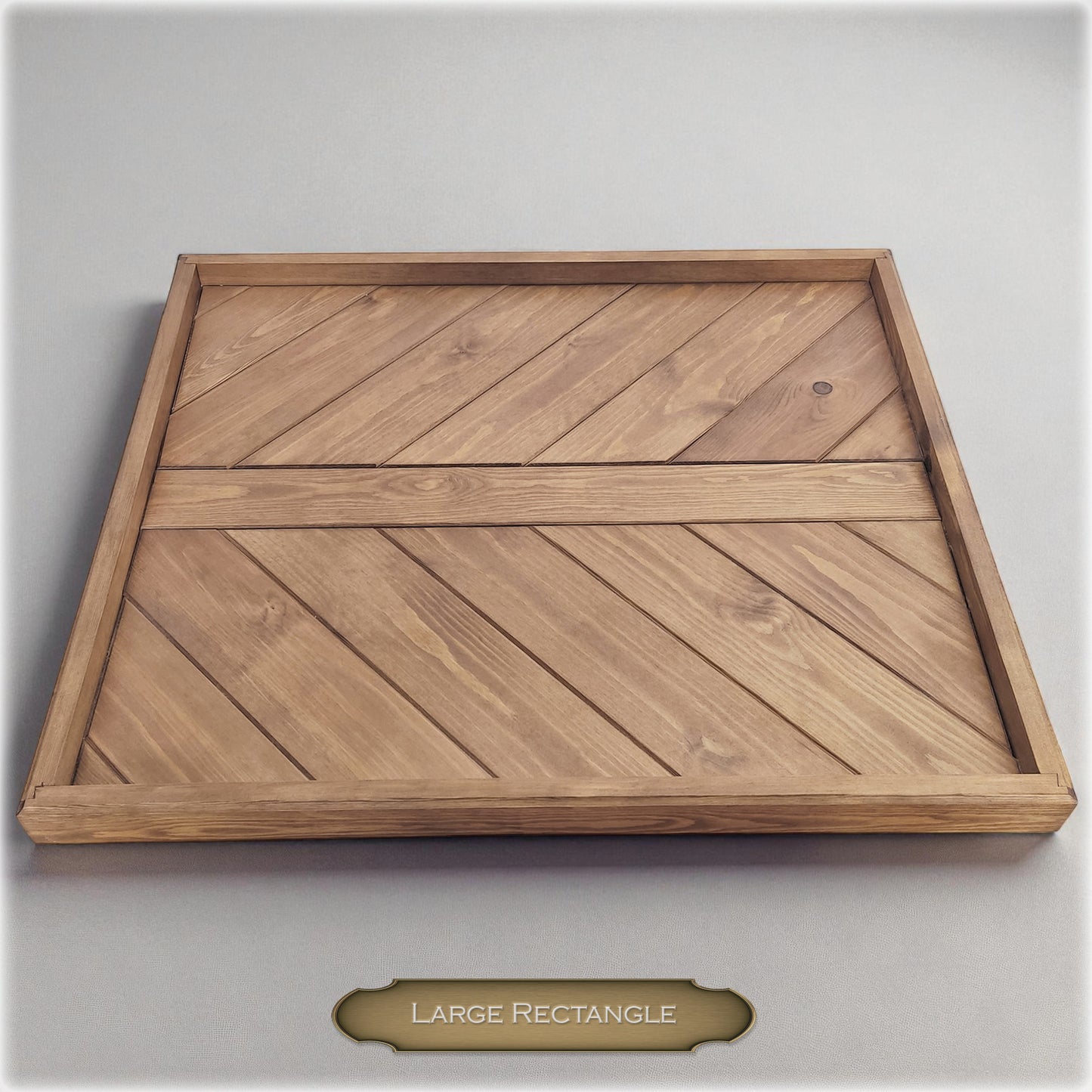 Wooden tray with a zigzag pattern on a gray background