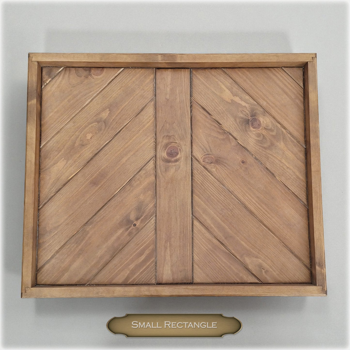 Wooden decorative panel with a small rectangle label on a white background