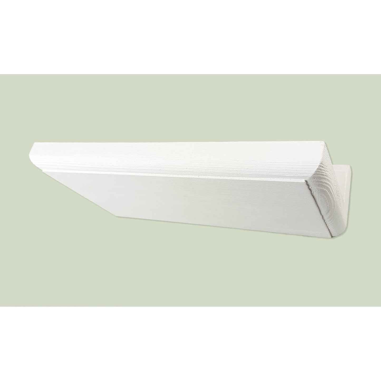 White floating shelf on a light green background