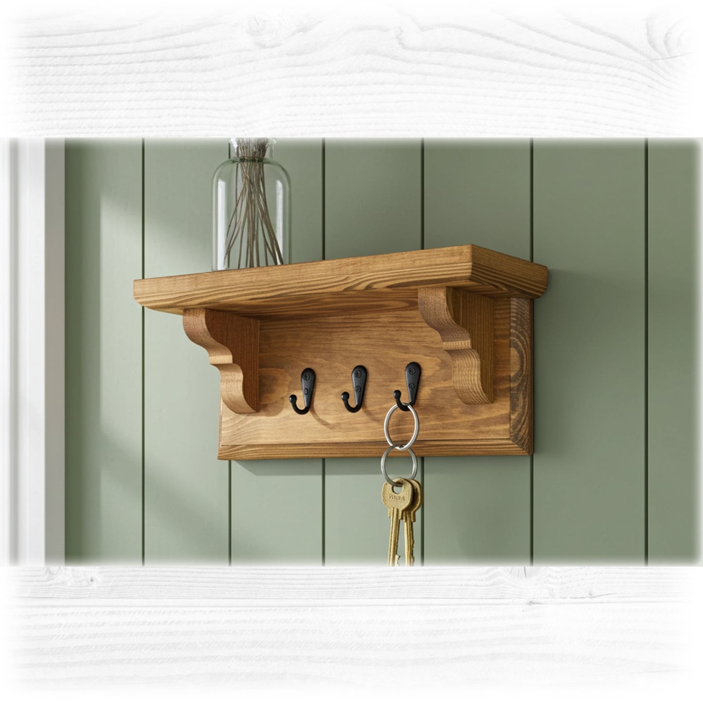 Wooden shelf with hooks against a green wall